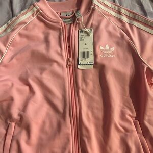 Adidas Pink Zip-Up Jacket with White Logo. Cost each or both for $40.00